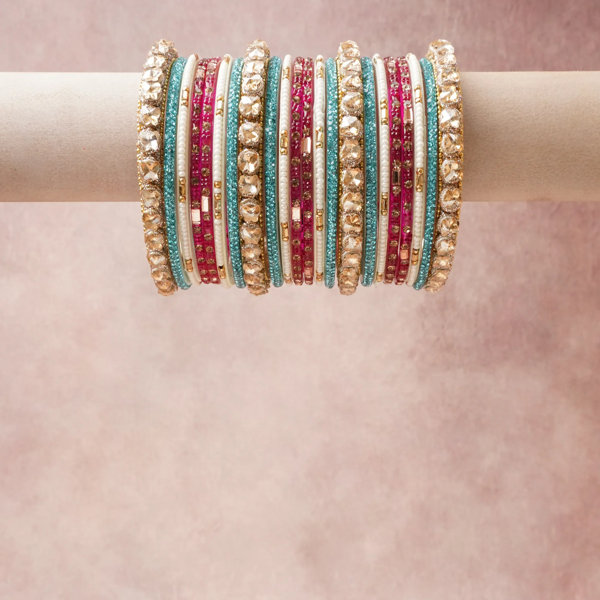 A grounding Red forms the heart of the set, while touches of Sky Blue, Gold add charm.

A thoughtful composition of Gold-toned Alloy, Glass (faceted, solid, and beads), Synthetic Pearl, Resin/Lac, designed to feel complete without being heavy.
Each element layers seamlessly, creating a look that is refined, wearable and quietly striking.
